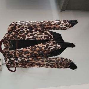 Lepard and black body suit